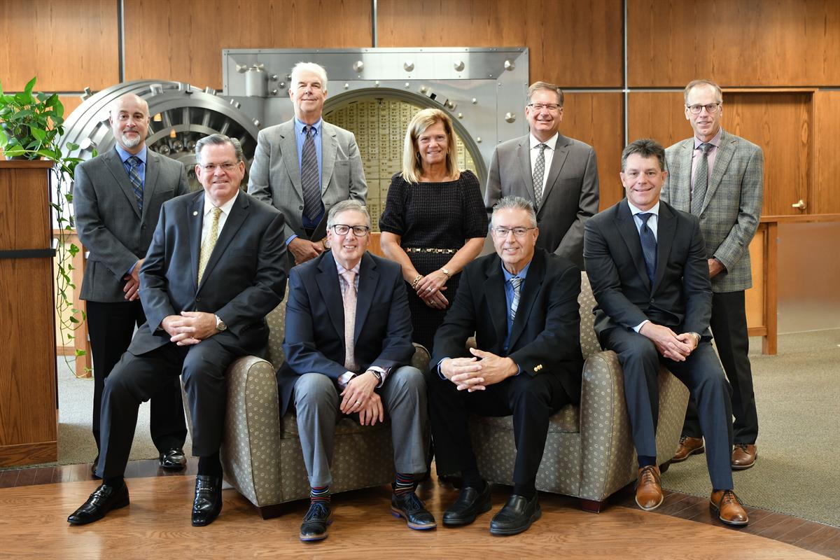 The photo depicts the 9 members of the Forte Bank Board of Directors.